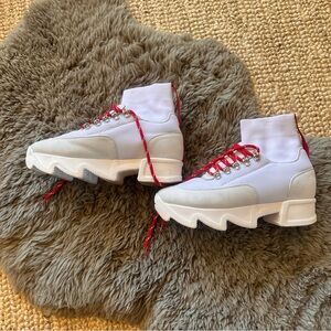 IRI NYC White Sneakers with Red Accents.